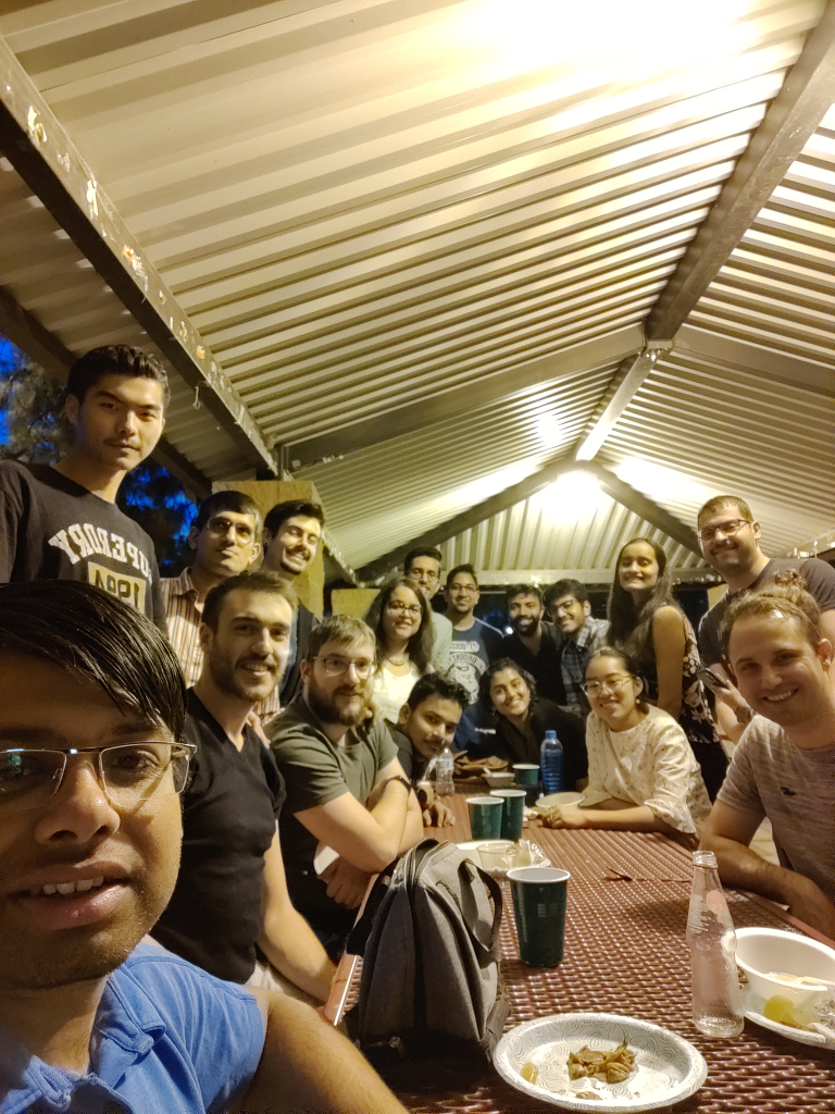 group of people under a park structure
