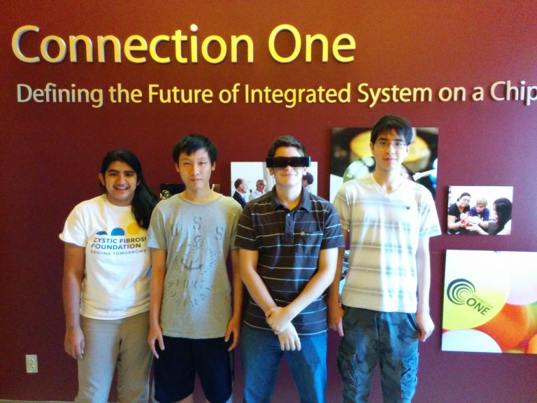 Students in front of a wall